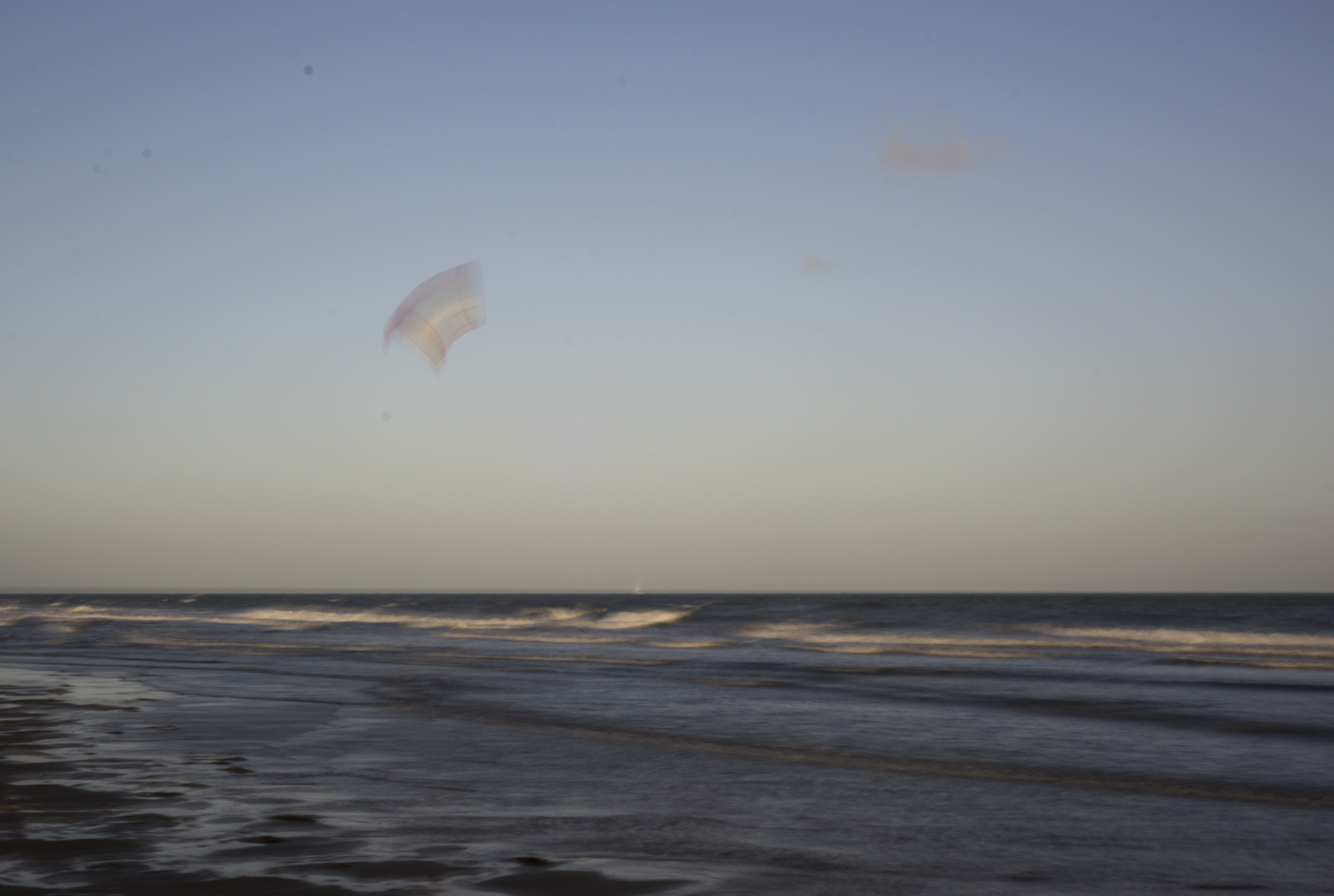 photo post-processed long exposure yaverland kite surfer